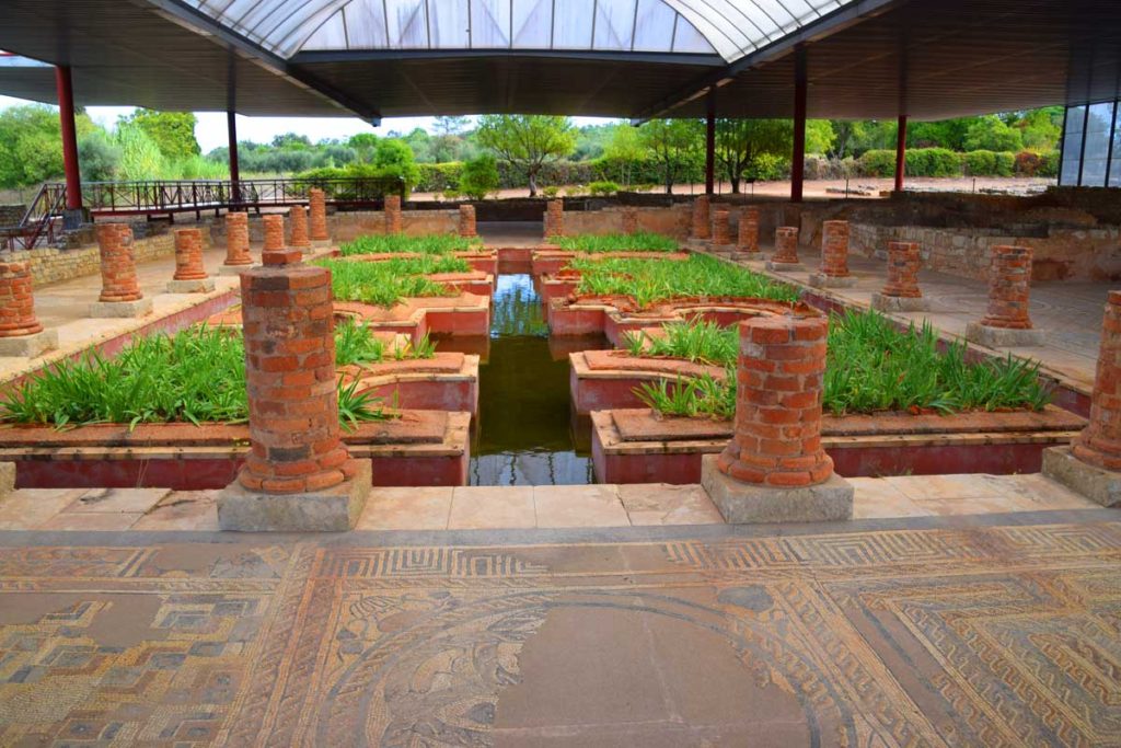 The 1st-century Casa dos Repuxos, a luxury residence with water gardens and mosaics representing the four seasons.