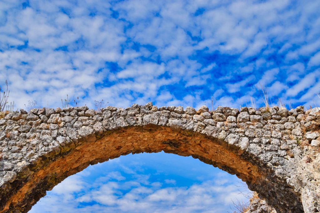 Stone Arches and Blue Skies at Conimbriga